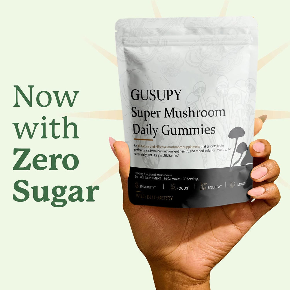 GUSUPY Lions Mane gummy serving on desk suggests daily wellness ritual.