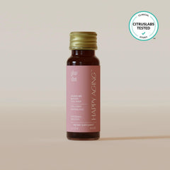 Happy Aging Glow Shot bottle tilt demonstrating easy on-the-go hydration.