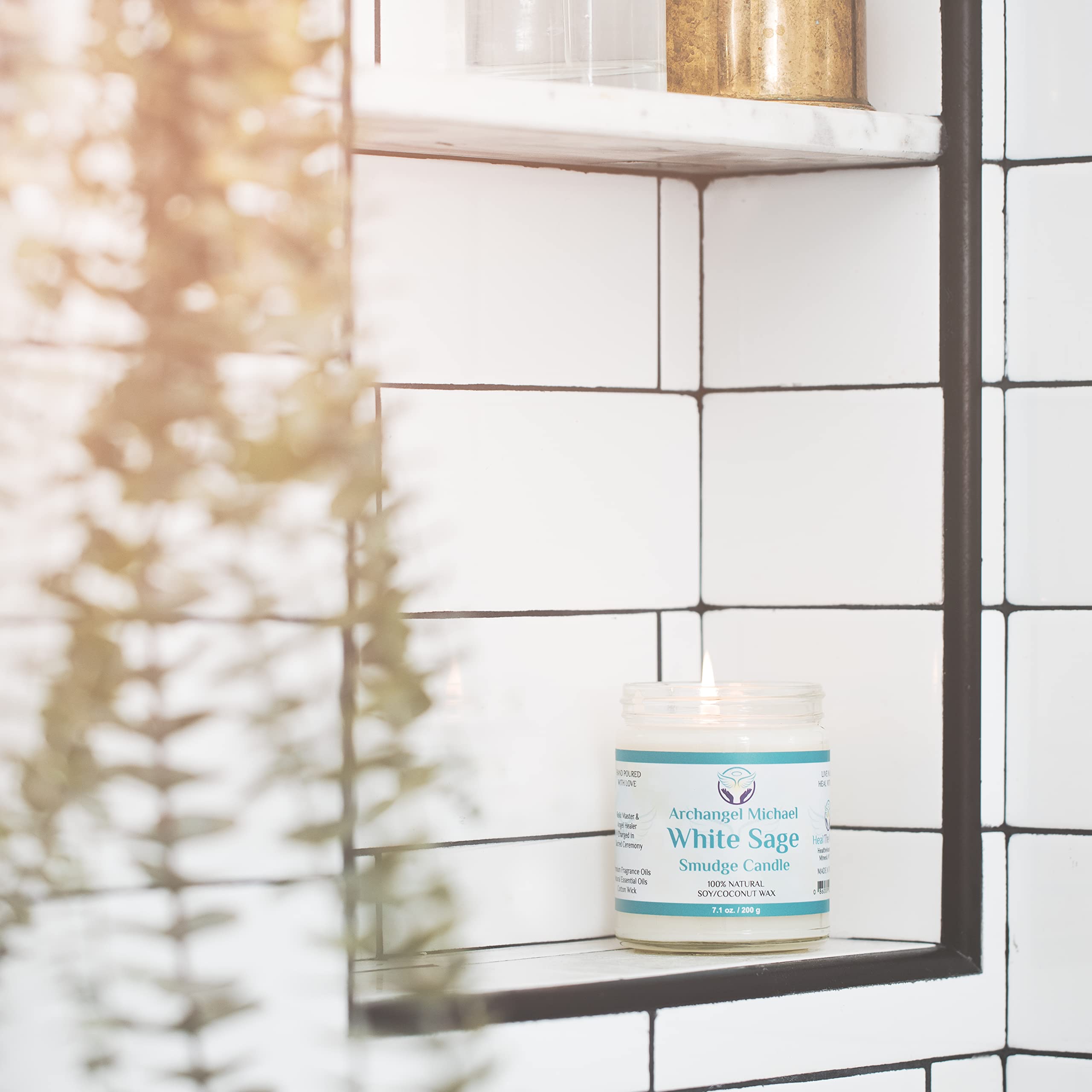 Heal The Masses White Sage Candle ritual use demonstrates energy cleansing atmosphere in practice.