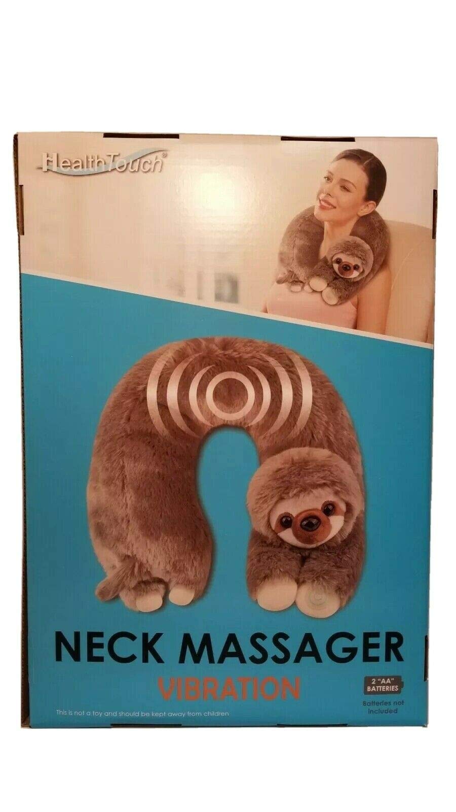 Health Touch sloth huggable massager on couch demonstrates cozy design and portable relaxation
