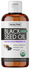 Healths Harmony black seed oil bottle with pour spout for easy daily use and antioxidant support.