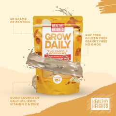 Healthy Heights Grow Daily vanilla powder being stirred into a milkshake.