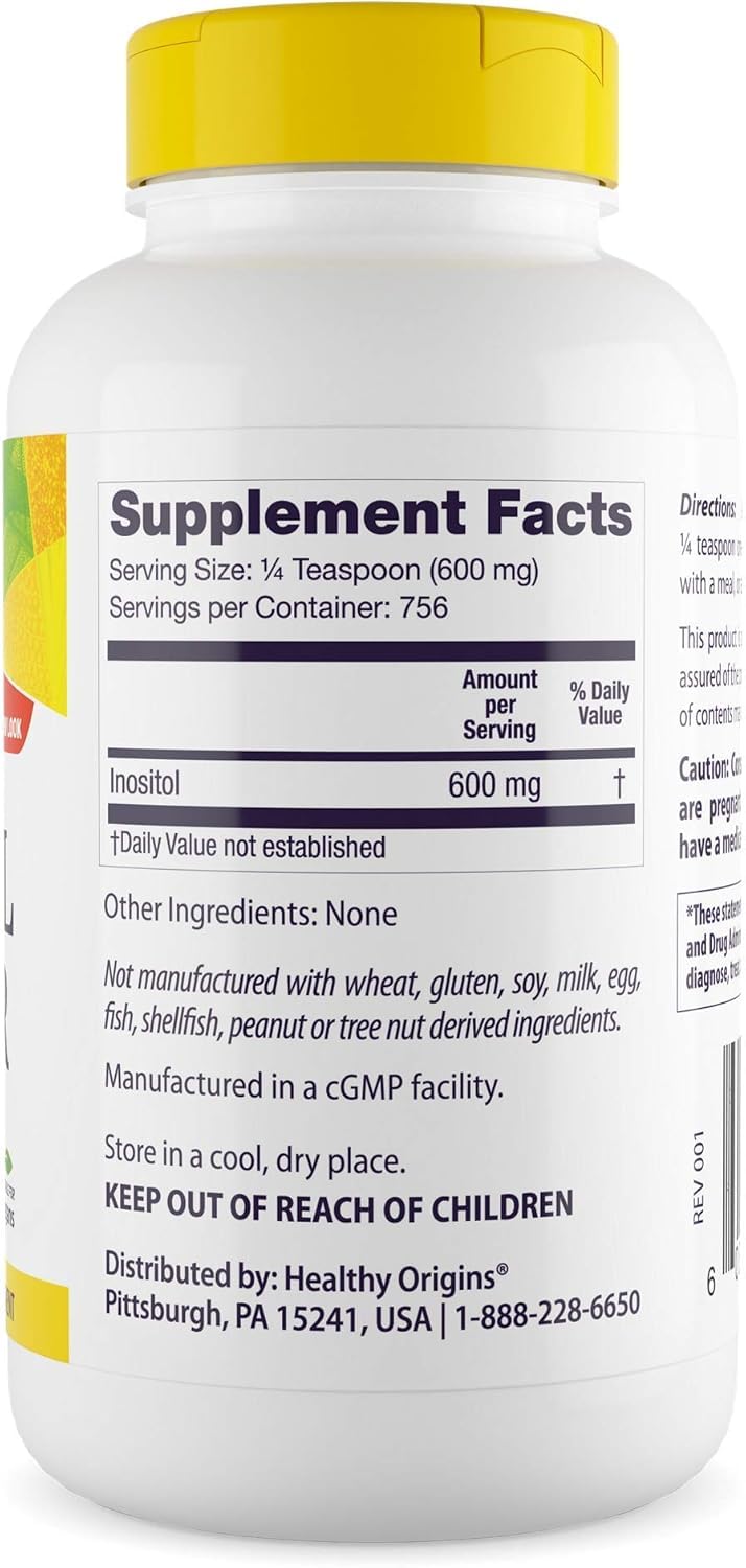 Healthy Origins Inositol Powder bottle closeup showing powder texture and label.