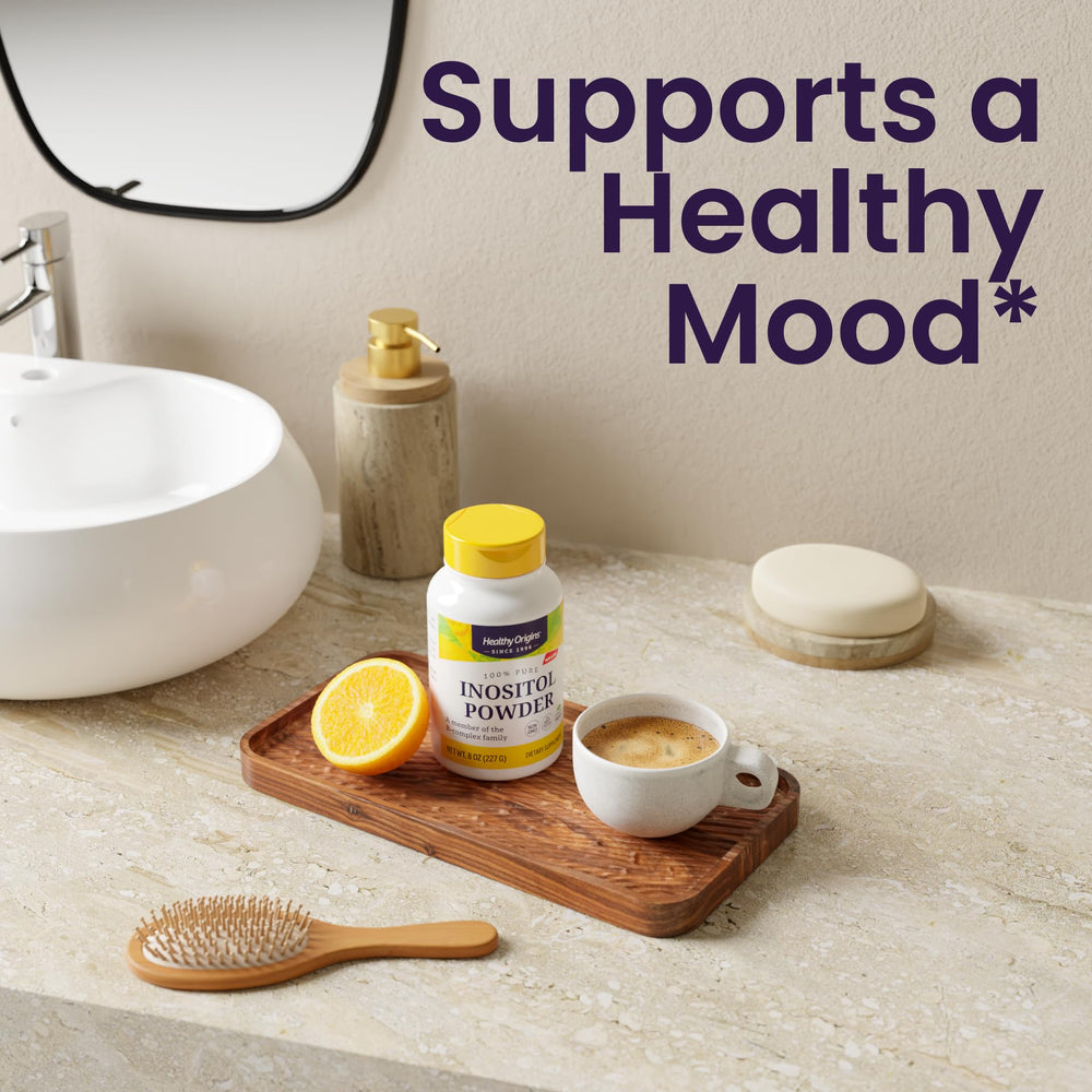 Healthy Origins Inositol Powder poured into glass conveys easy mixability and daily dosage.