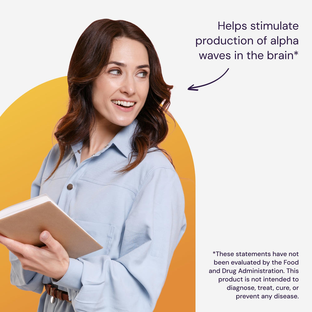 Healthy Origins L-Theanine bottle on desk signals focus-friendly daily use.