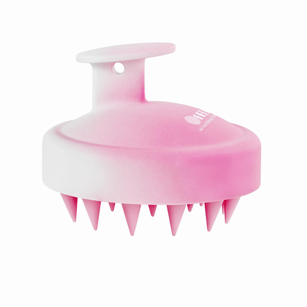 HEETA scalp massager with soft silicone bristles for gentle cleansing.