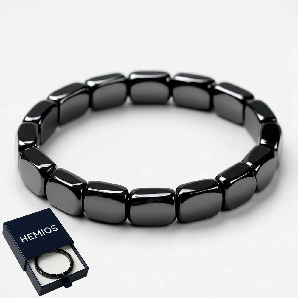 Hemios hematite bracelet on wrist highlighting modern masculine style.