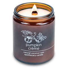 Hemlock Park Pumpkin Creme candle with crackling wood wick creating a cozy glow