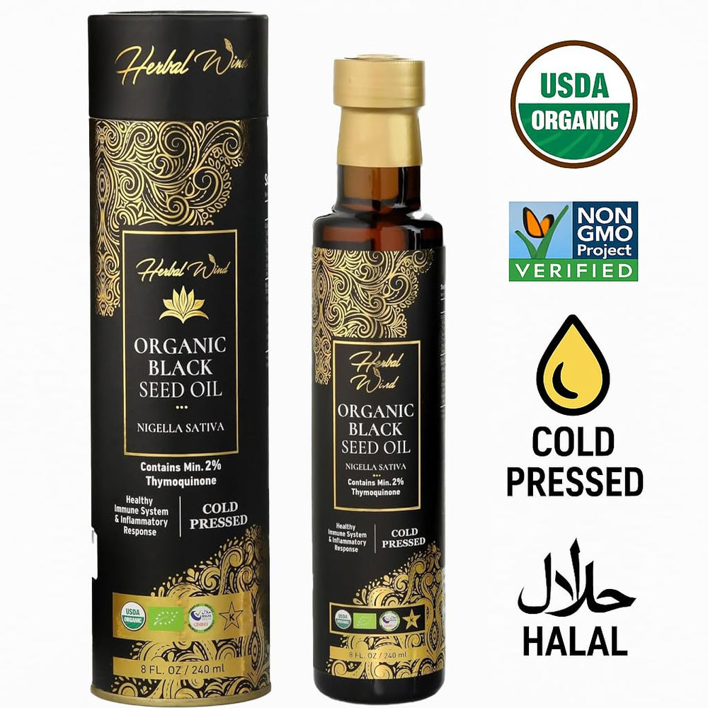 Herbal Wind Black Seed Oil beside a glass for daily balance.
