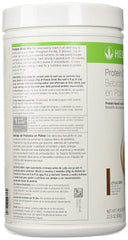 Prepared Herbalife chocolate shake served in a glass for a quick snack.