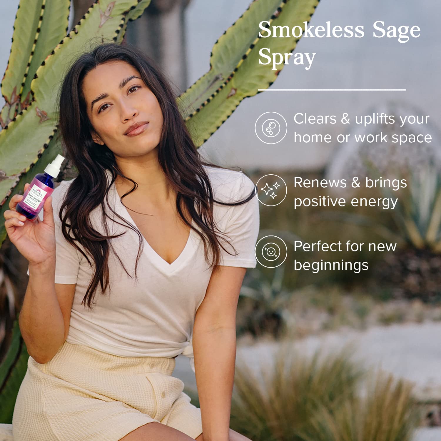 Close-up of Heritage Store Aura Smudge sage oil bottle showing juniper for cleansing energy