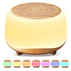 HEYAXA white noise sound machine with wood grain finish, enhancing bedside calm.