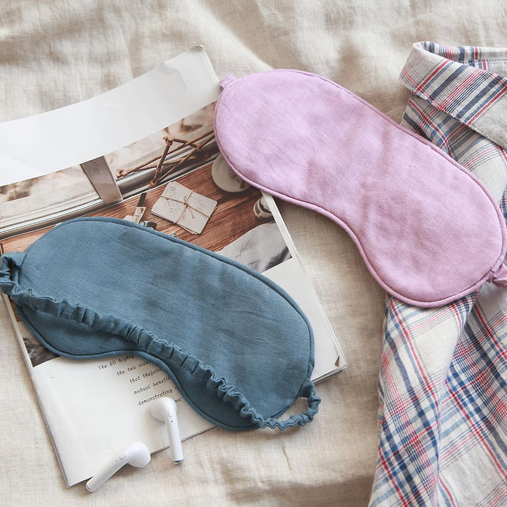 Hicoolfun linen eye mask in hand demonstrates soft texture and ergonomic shape.