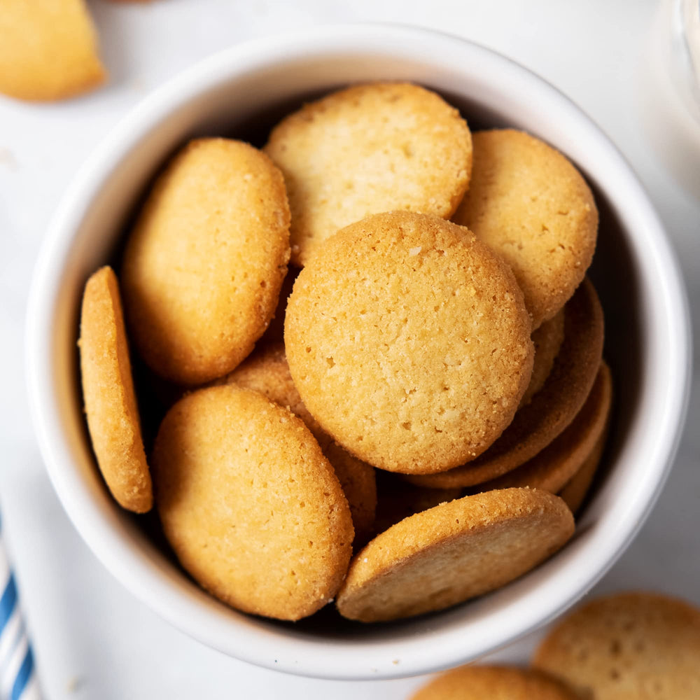 HighKey Vanilla Wafers served with coffee for a light treat.