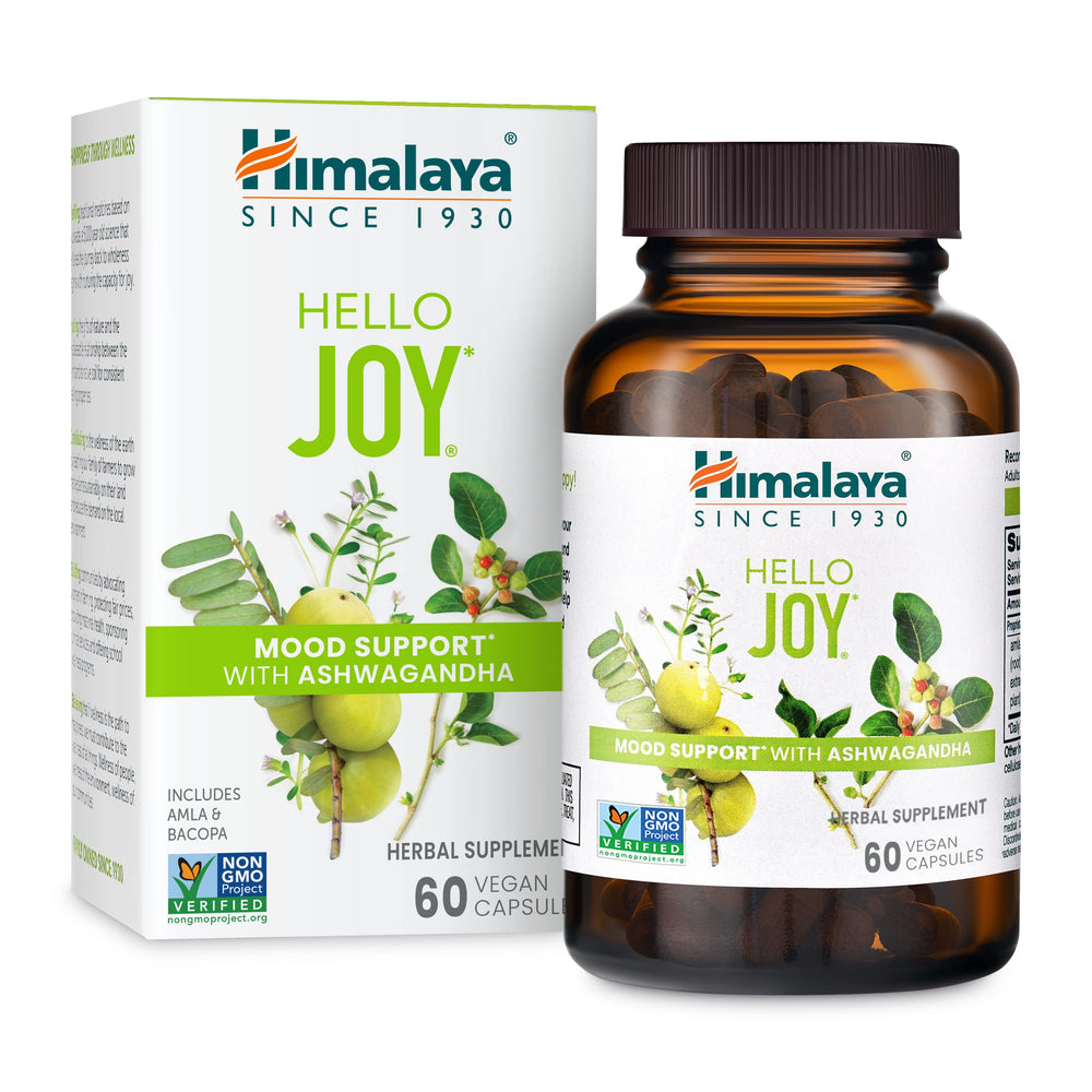 Himalaya Hello Joy bottle on wood surface promotes a positive outlook.