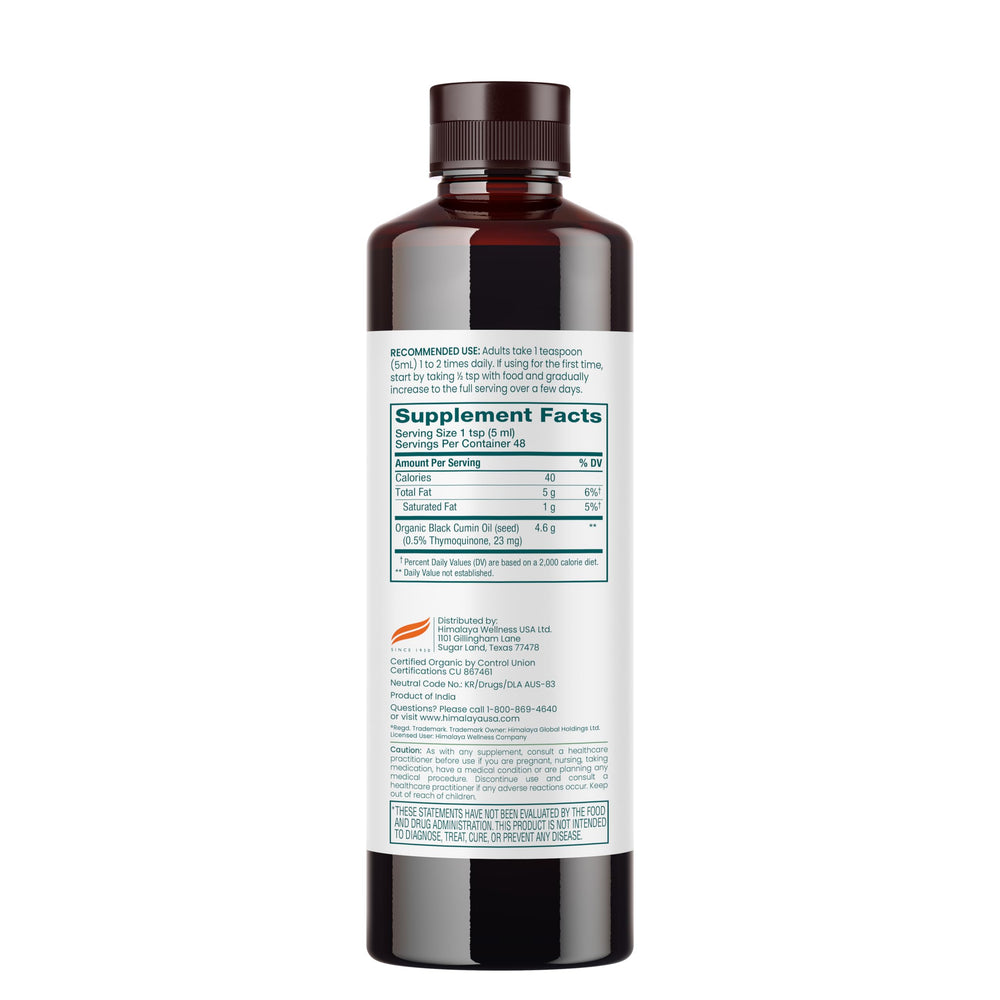 Himalaya Black Seed Oil being poured for easy daily dosing
