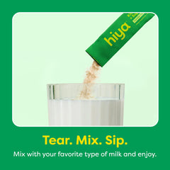 HIYA scoop measuring a serving of greens powder for kids