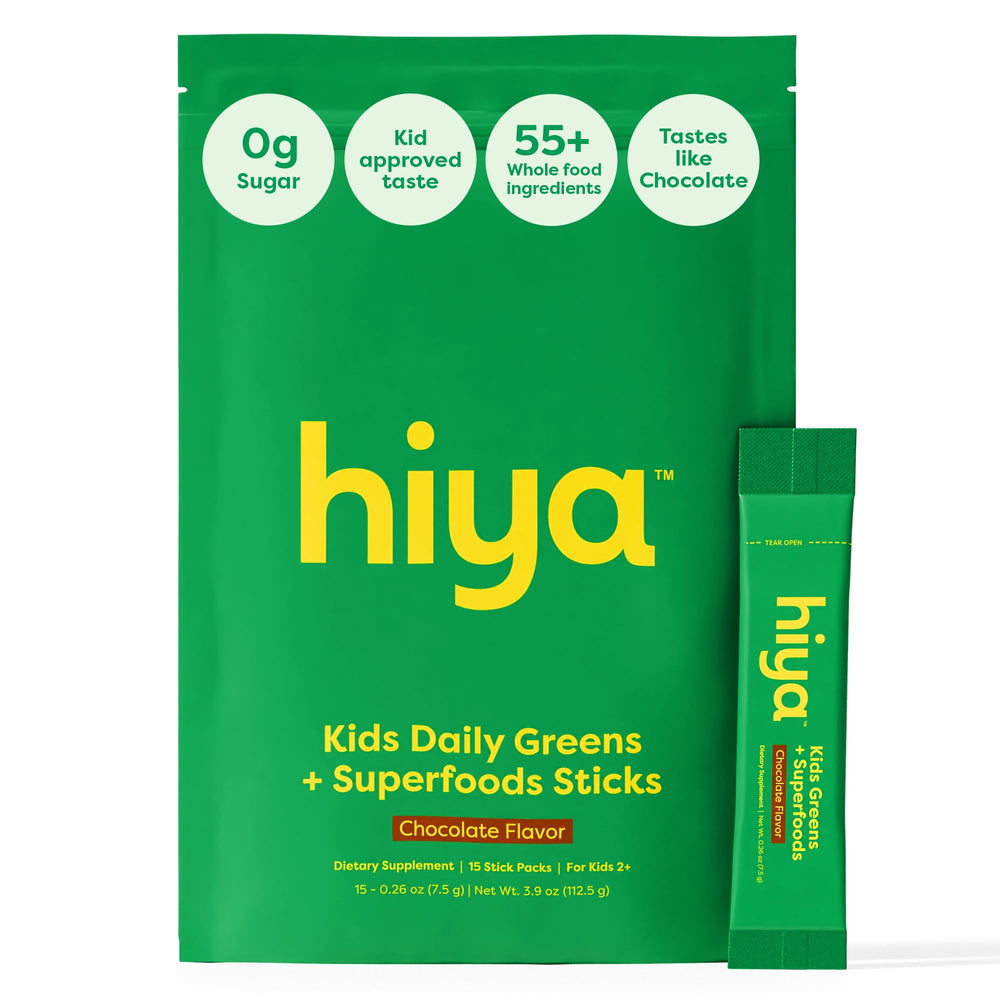 HIYA Kids Greens Powder Sticks in front of the tub for convenient daily greens.