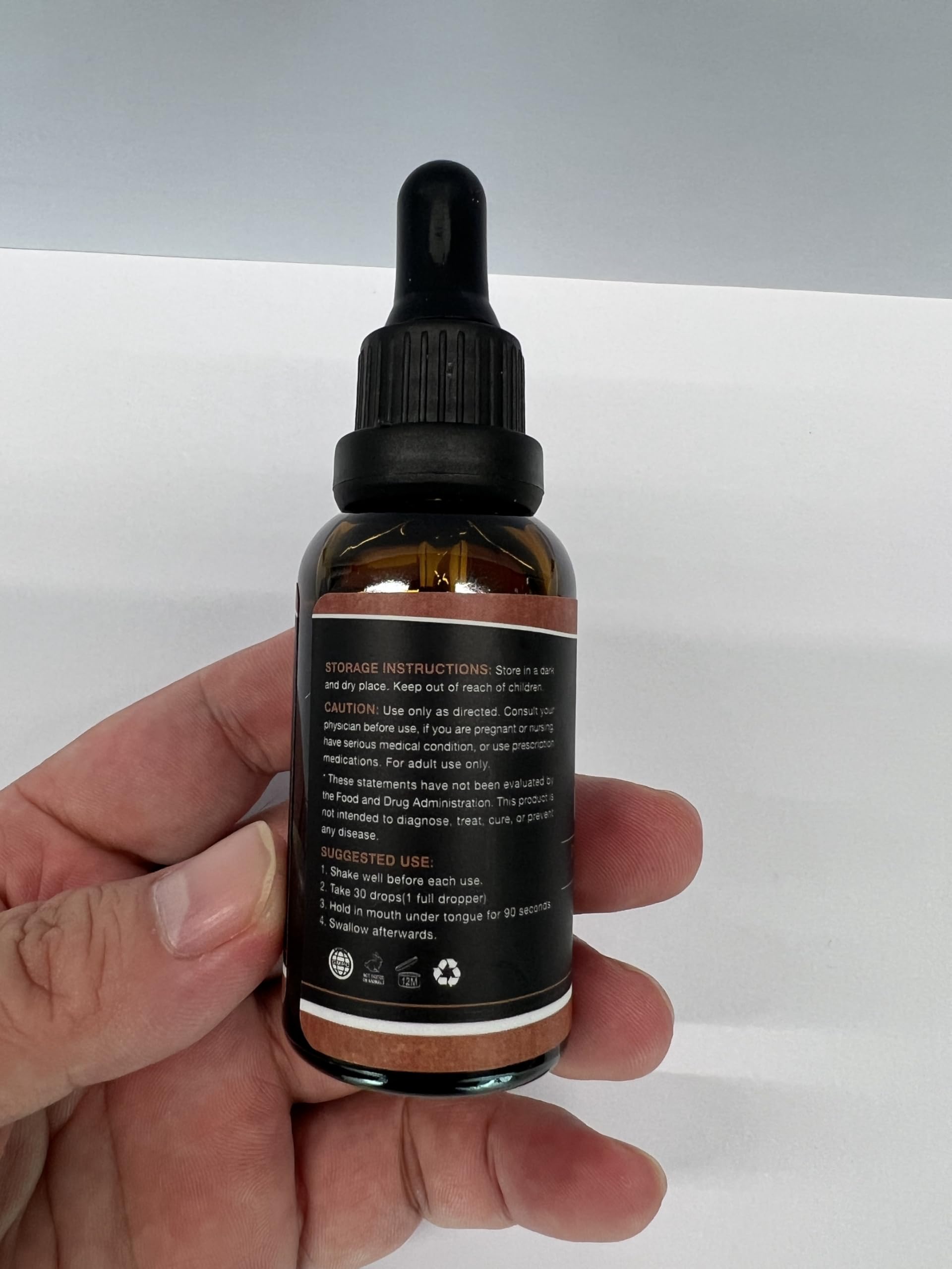 Close-up of HMone Hemp Oil 4-pack packaging for value.