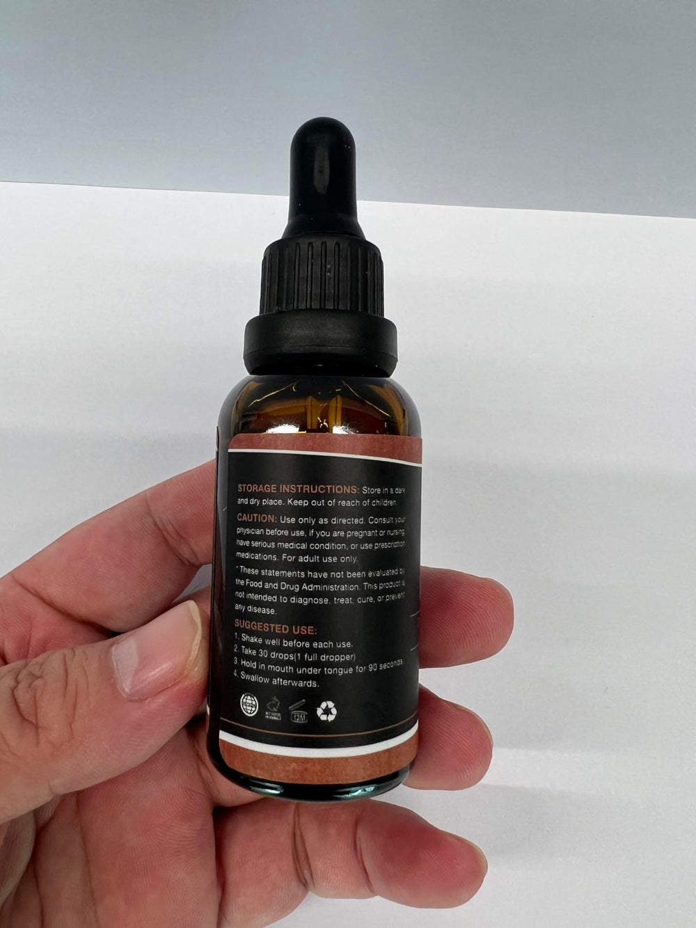 Close-up of HMone Hemp Oil 4-pack packaging for value.