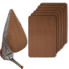 Hockydis wave-pattern anti-slip pad for shoes enhances grip on slick floors.