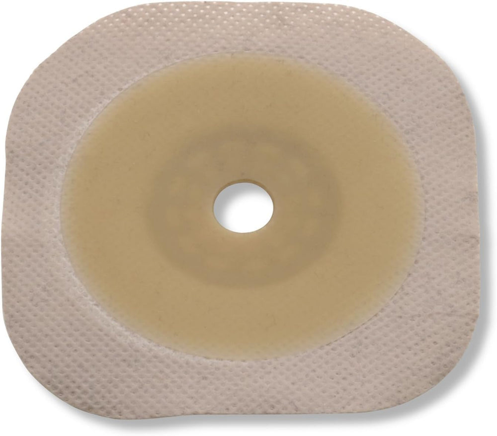 Hollister 14604 flat Flextend barrier with beige floating flange reduces abdominal pressure during pouch attachment.