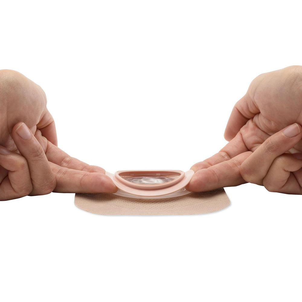 Floating flange reduces contact pressure on the abdomen.