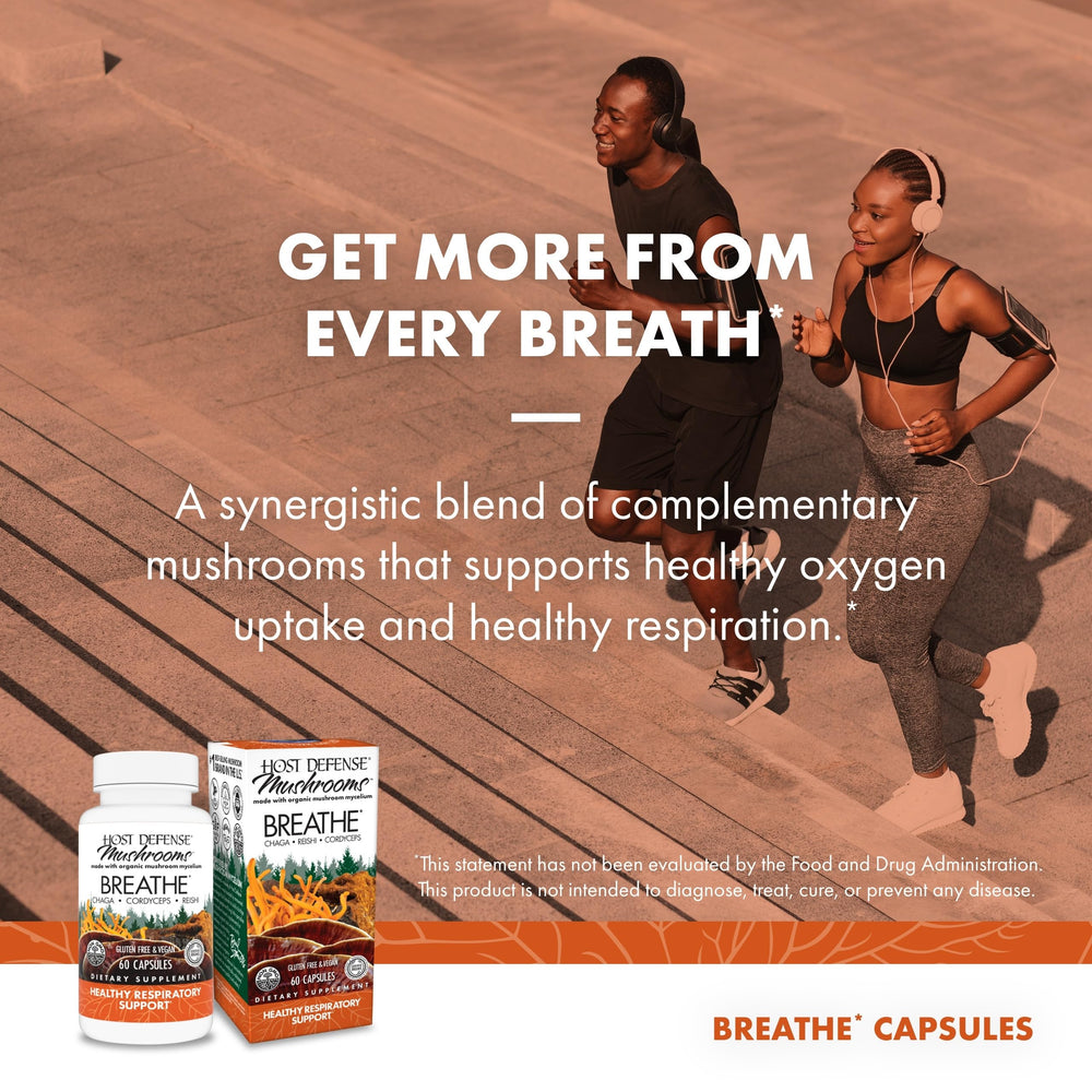 Host Defense Breathe bottle beside water during morning routine.