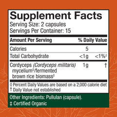 Cordyceps capsules pour with glass of water for daily use.