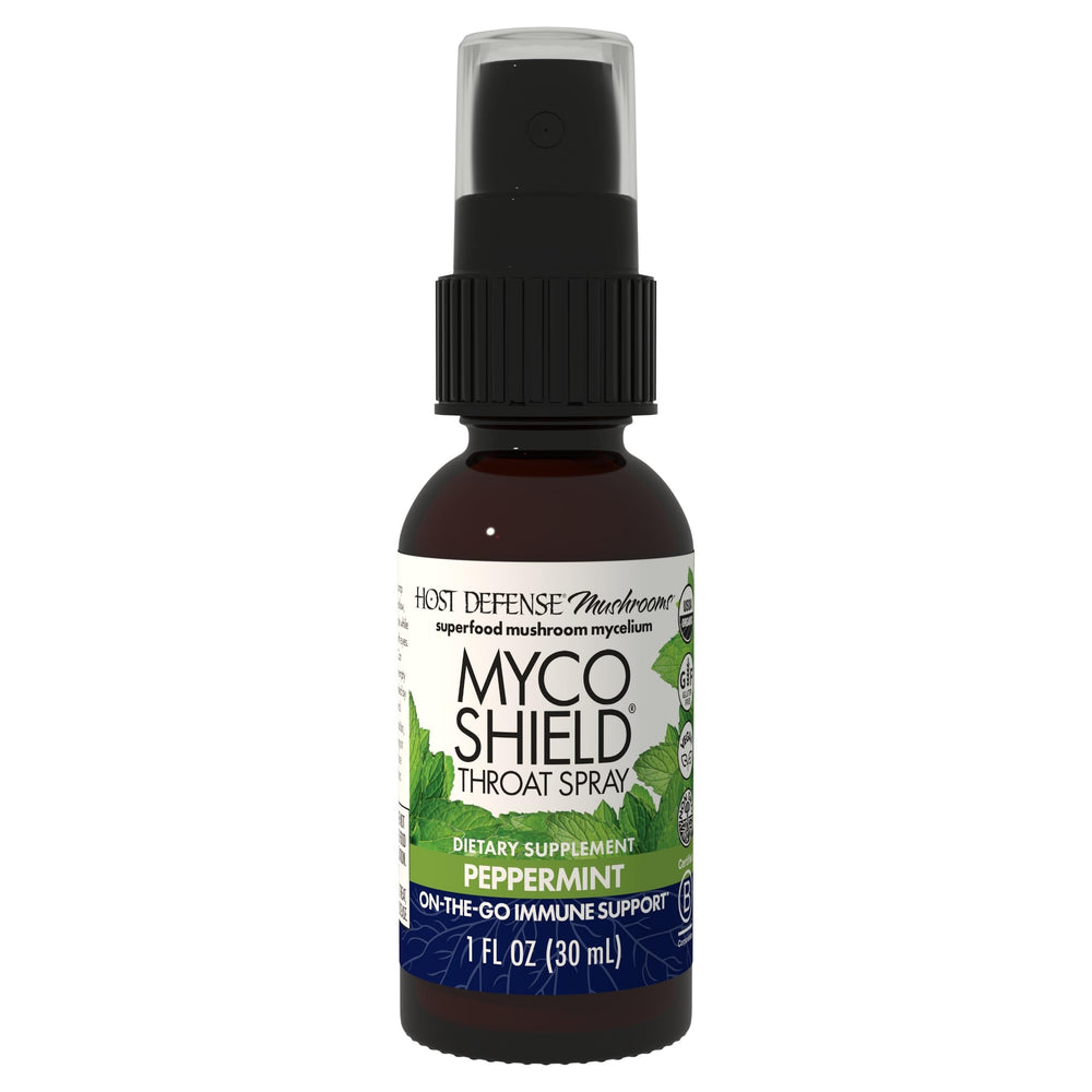 Host Defense MycoShield throat spray bottle close-up for on-the-go immune support.