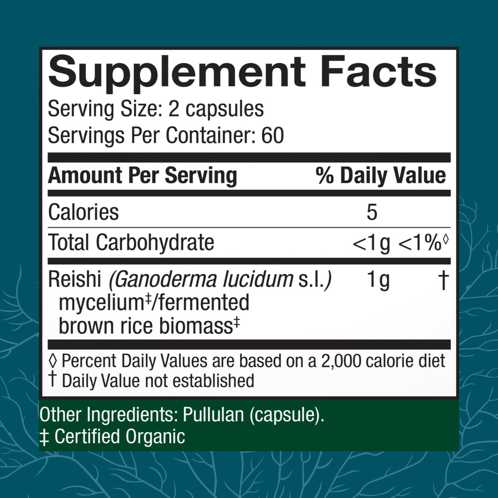 Host Defense Reishi capsules closeup highlights capsule texture and easy swallowing.