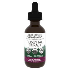 Host Defense Turkey Tail Extract bottle close-up; supports digestive balance with organic mushroom extract.