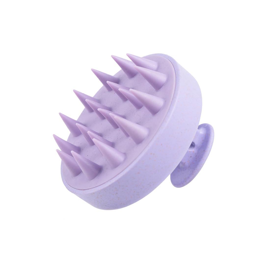 Hotosu scalp massager brush with soft silicone tips for soothing shampoo sessions.
