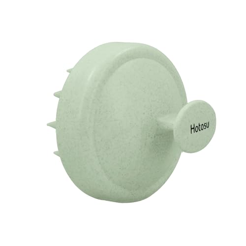 Hotosu silicone scalp scrubber close-up showing flexible bristles for exfoliation