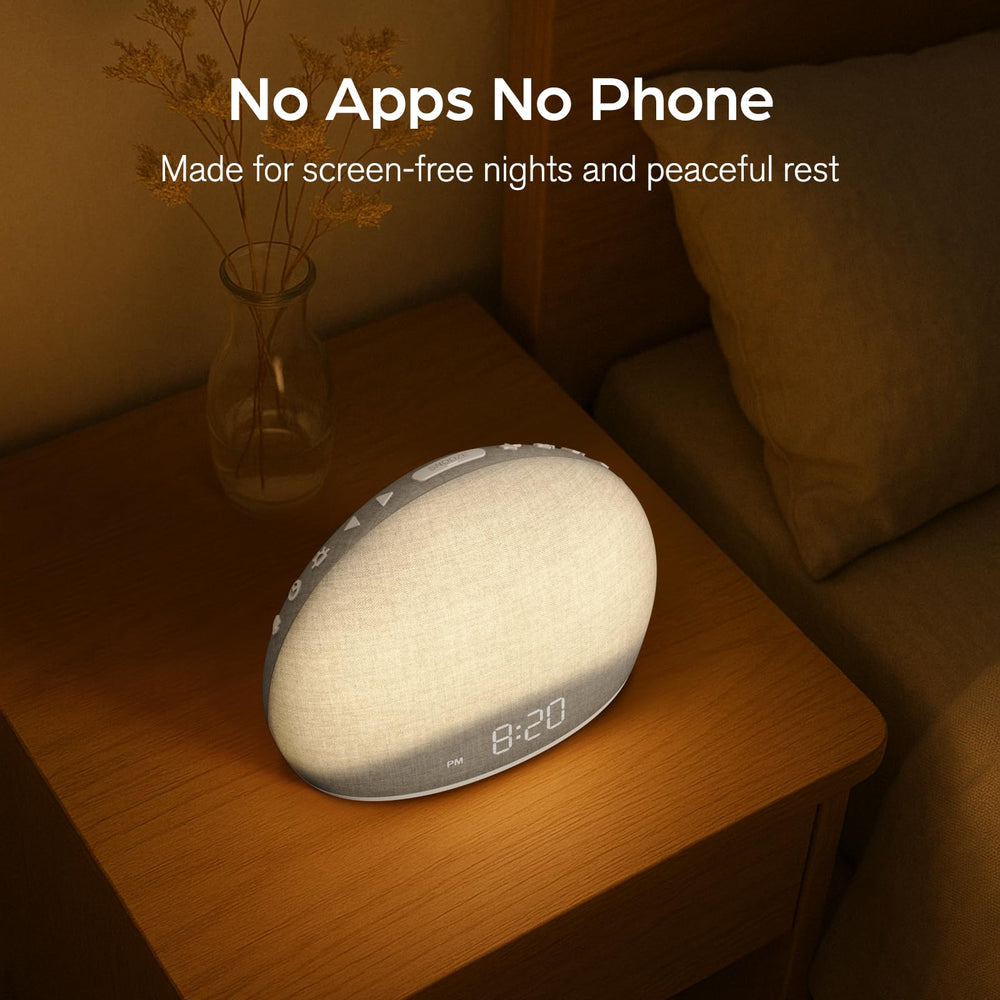 HOUSBAY Sunrise Alarm Clock white-noise speaker delivering soothing ambient sounds.