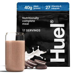 Huel Black Edition Cookies and Cream tub close-up signals rich texture for convenient nutrition.