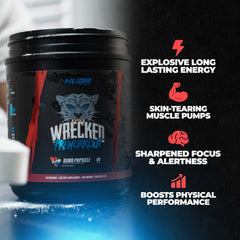 Huge Supplements Wrecked pre-workout scoop in hand suggests fast mix and training readiness