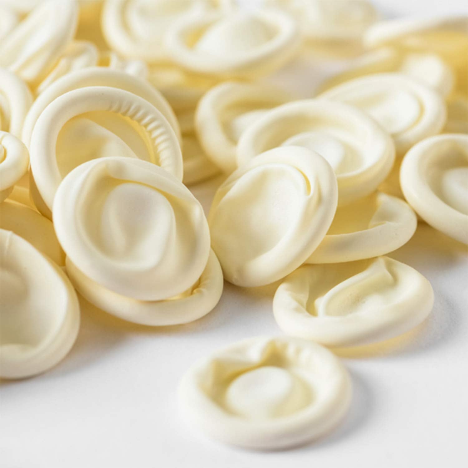 Hulless finger cots on hand demonstrate finger protection during delicate tasks