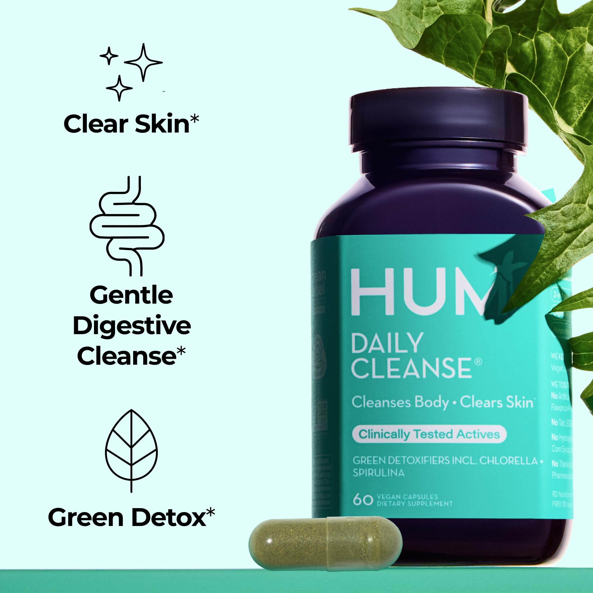 Hum Daily Cleanse capsules closeup showing plant-based nutrients for wellness.