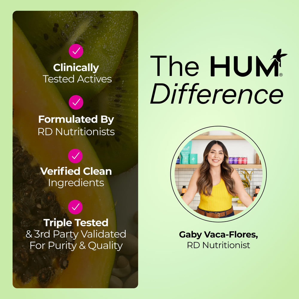 HUM Gut Instinct bottle with glass of water for easy use