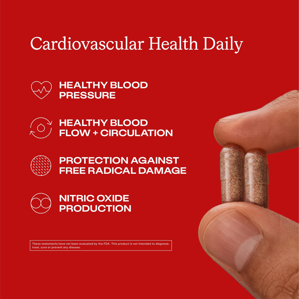 Close-up of Humann capsules, showcasing a plant-based formula for potential blood flow support.