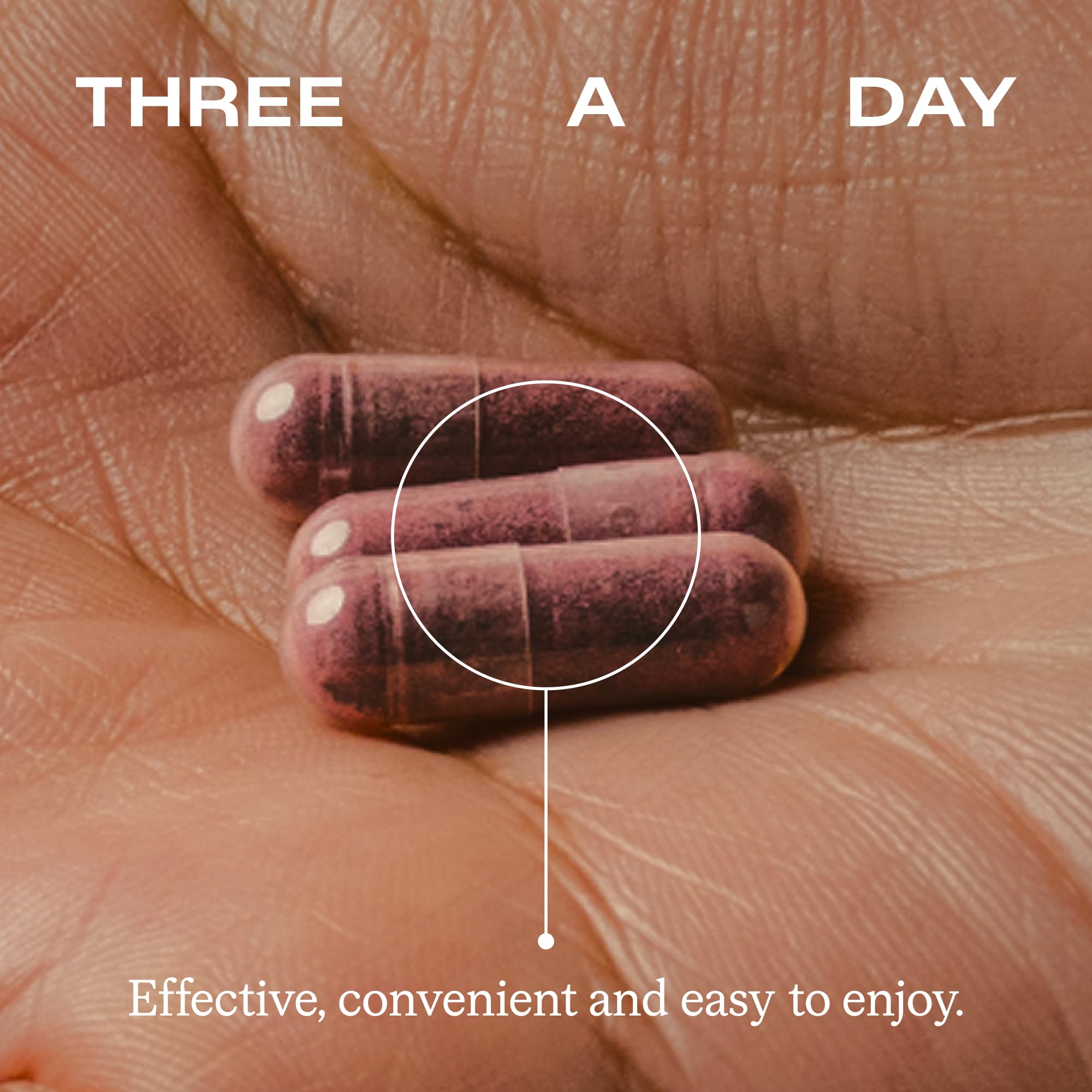 Humann SuperBeets capsules with a glass of water for easy consumption.