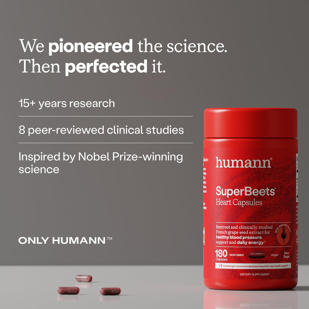 Humann SuperBeets measuring scoop beside capsules for accurate daily dosing.