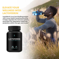 Pouring HumanX Lactoferrin 500mg bottle during daily routine.
