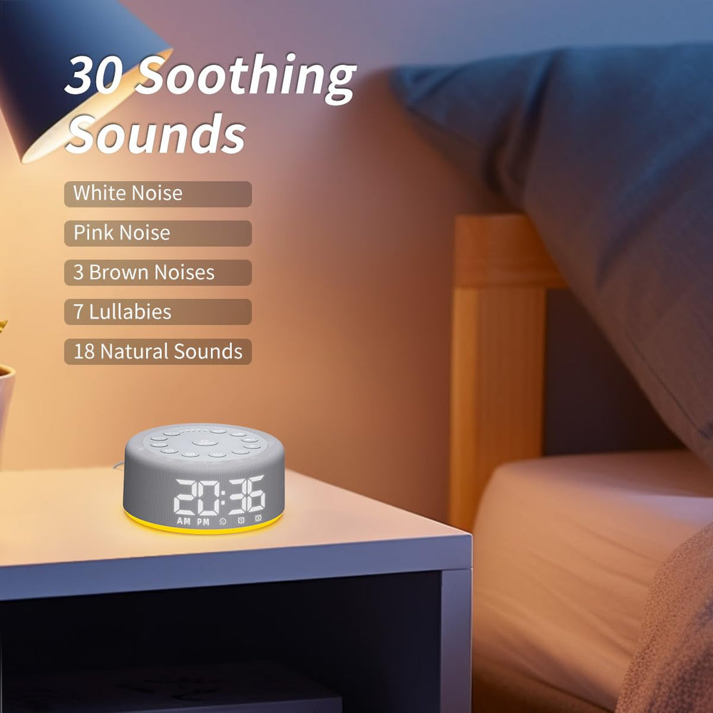 Hushing 12 color night light options illuminate a calm bedroom.