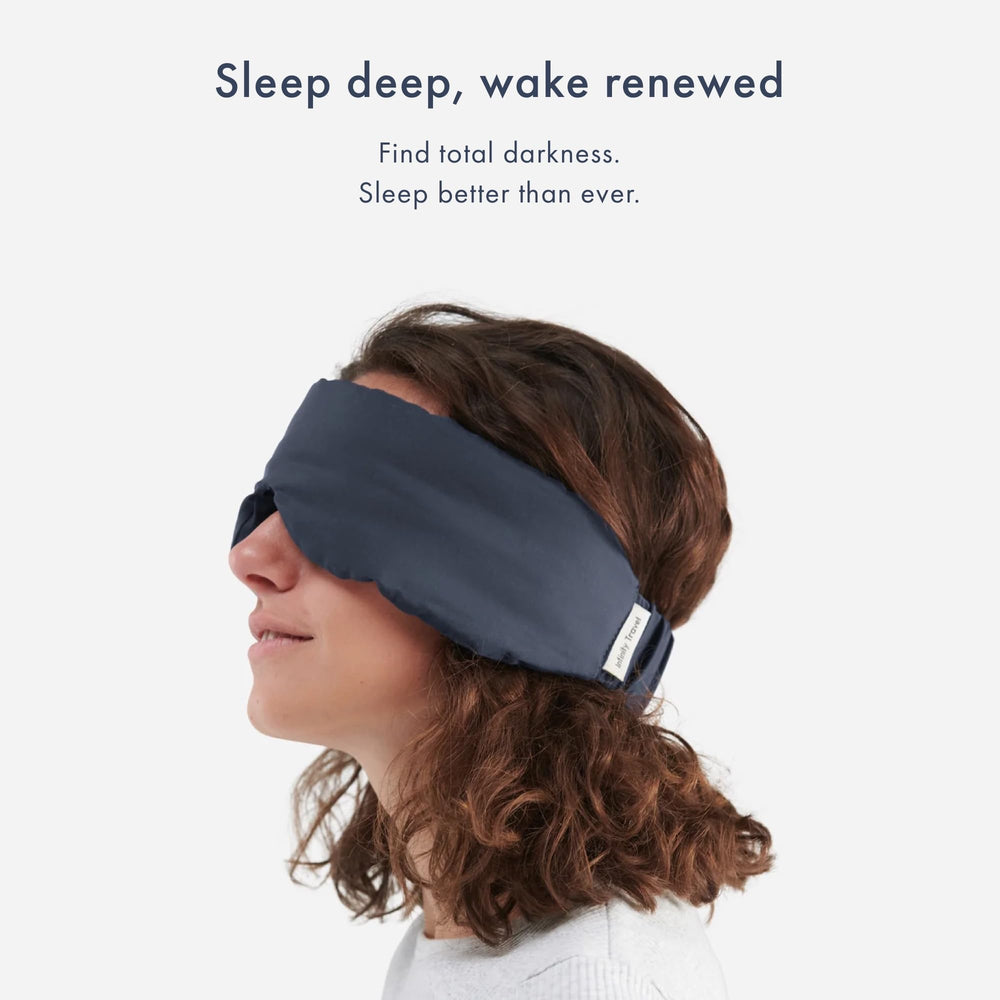 Huzi Infinity Travel Bamboo Sleep Mask blocks light entirely for hotel stays.