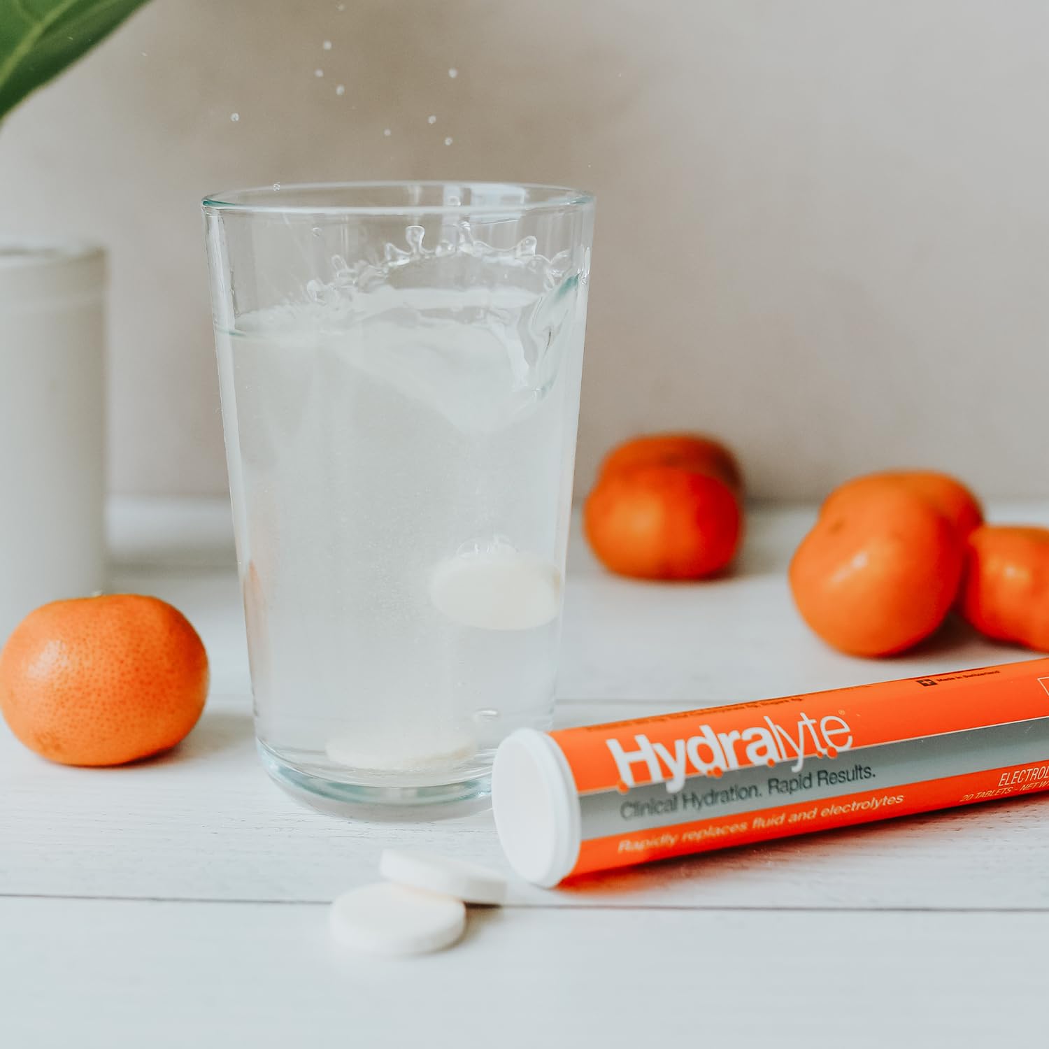 Hydralyte orange flavor tablets in travel-friendly container