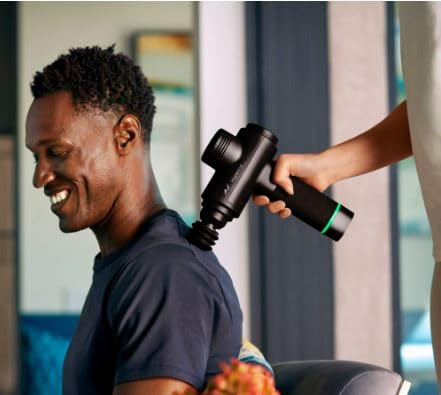 Person using Hyperice Hypervolt 2 Black on calf to relieve stiffness