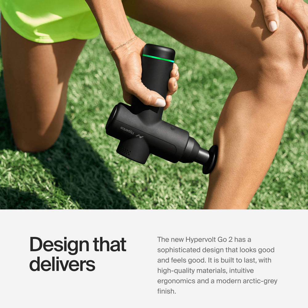 Hyperice Hypervolt Go 2 with two heads mounted for versatile therapy