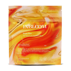 INBLOOM Brain Flow tub closeup highlighting the chocolate flavor and vegan formula for daily focus.